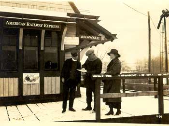 E. Smith and C. Murphy at train station